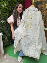 UNSTITCHED PURE MULMUL CHANDERI APPLIQUE HANDWORK SUITS.