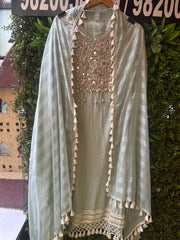 UNSTITCHED MULMUL CHANDERI HANDWORK SUITS.