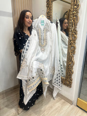 UNSTITCHED DESIGNER MULMUL HANDWORK SUITS.