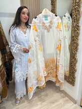 UNSTITCHED PURE DESIGNER MULMUL HANDWORK SUITS.