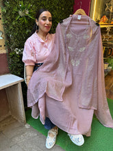 Unstitched pure MULMUL PITA WORK SUITS.