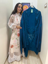 UNSTITCHED PURE MULMUL CHANDERI APPLIQUE CUTWORK SUITS.