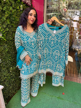 The Basanti Chinon Stitched Set