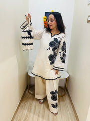 STITCHED PURE MULMUL CHANDERI COORD SETS WITH APPLIQUE WORK WITH FARSHI SALWAR.