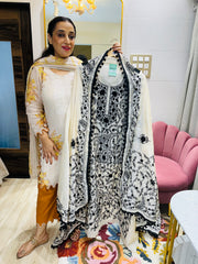 UNSTITCHED PURE MULMUL CHANDERI CALCUTTA WORK INSPIRED SUITS.
