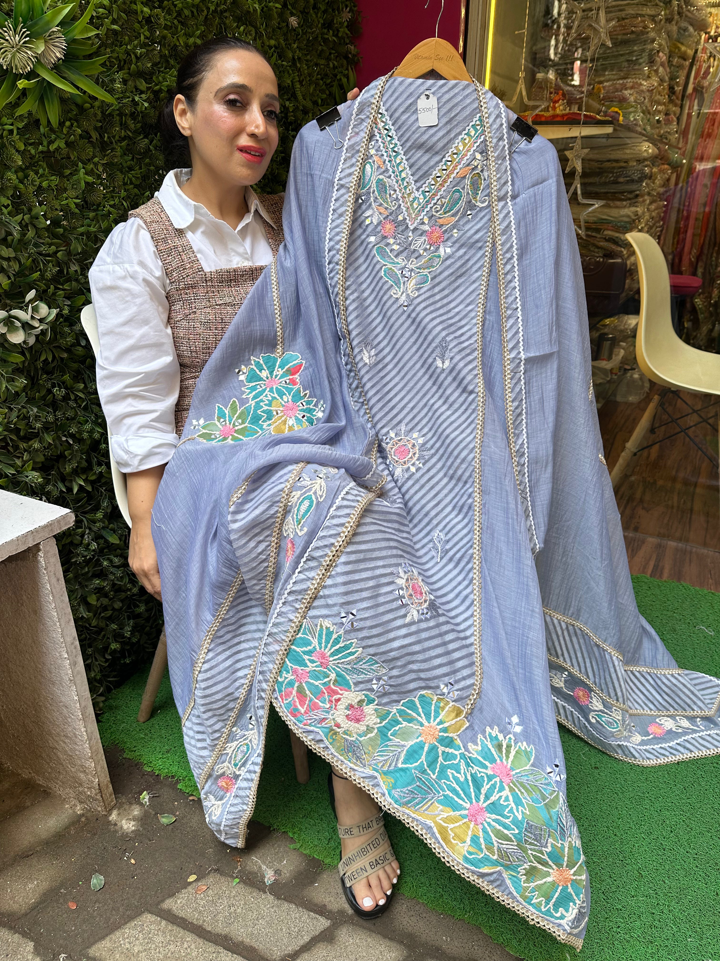 UNSTITCHED PURE MULMUL HANDWORK SUITS.