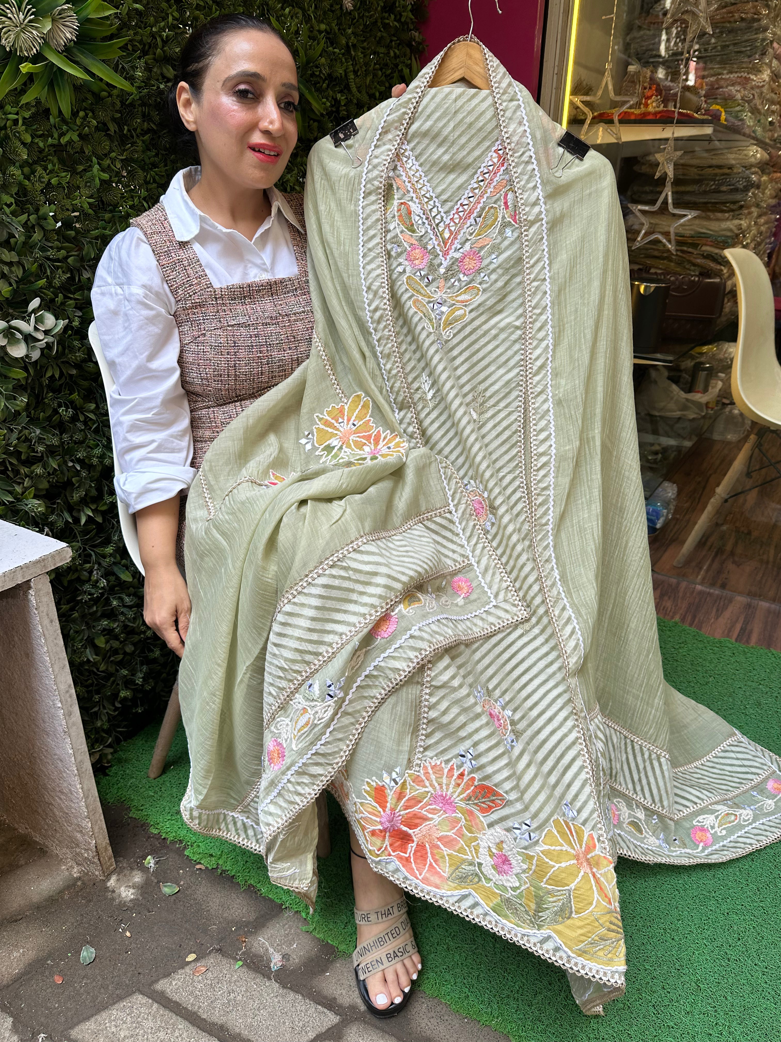 UNSTITCHED PURE MULMUL HANDWORK SUITS.