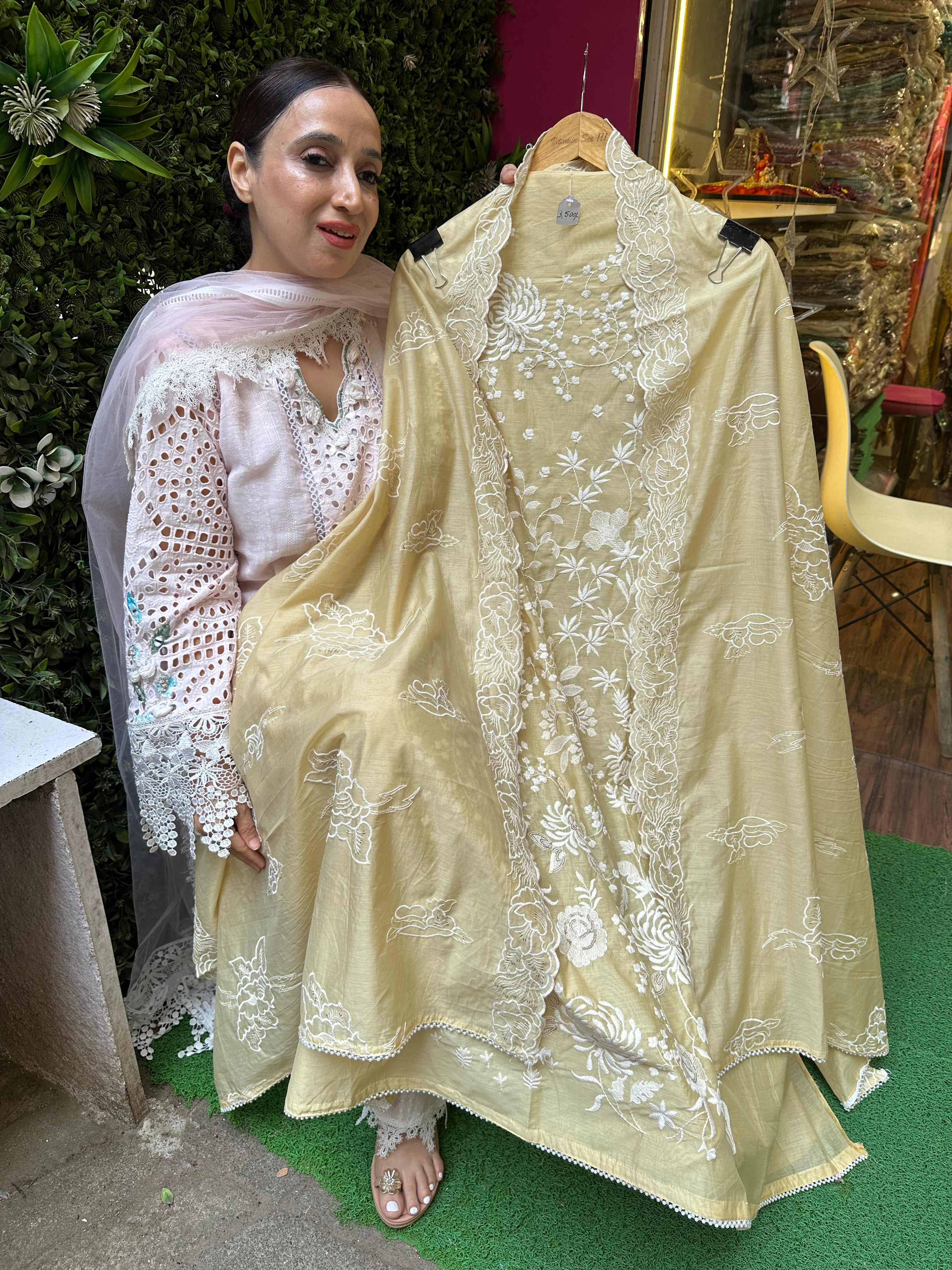UNSTITCHED PURE MULMUL CHANDERI RESHAM WORK SUITS.