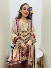 STITCHED PURE CHINON AJRAK PRINTING HANDWORK SUITS WITH FARSHI SALWAR.