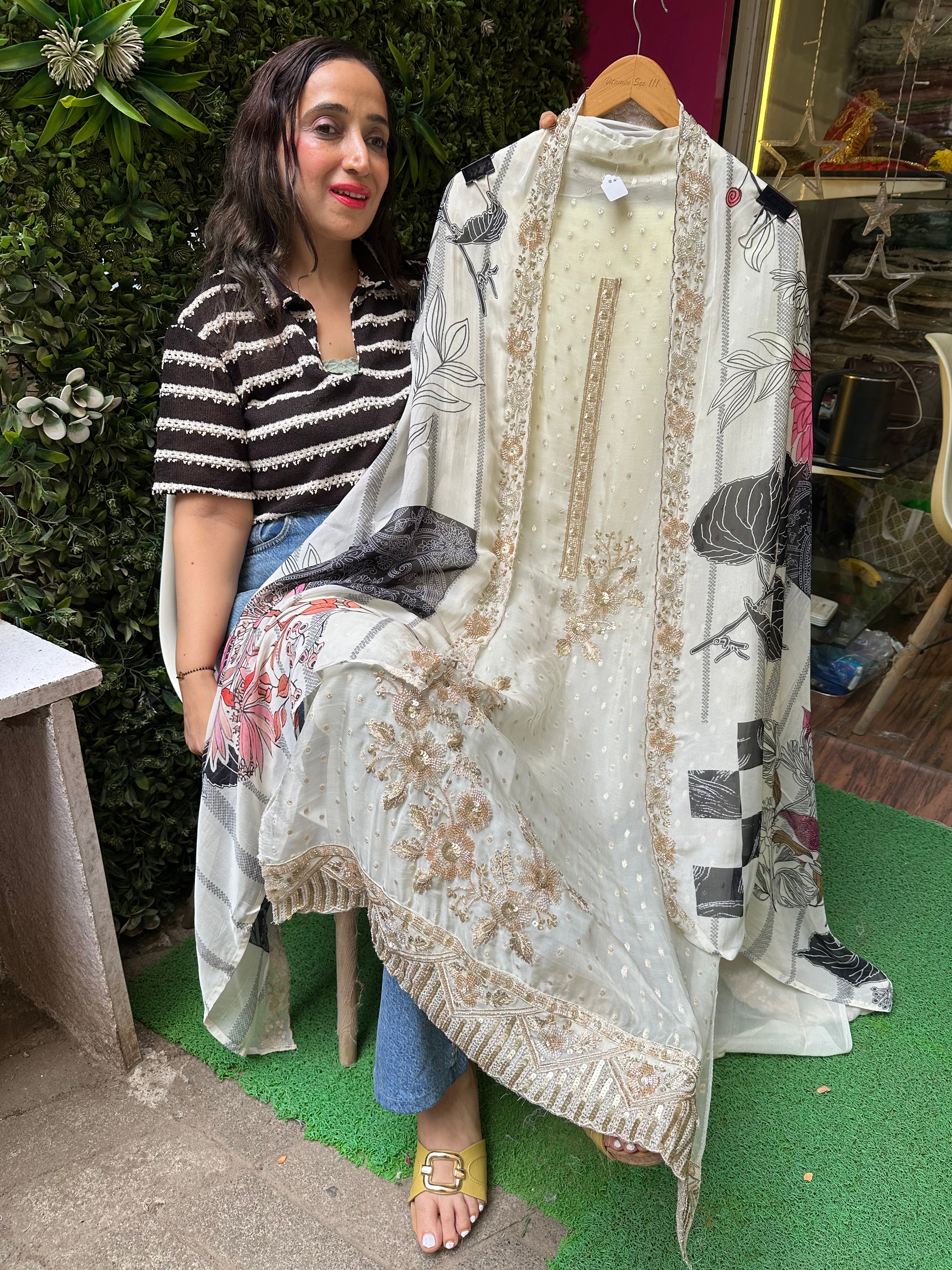 UNSTITCHED PURE SOFT ORGANZA NALKI HANDWORK SUITS.