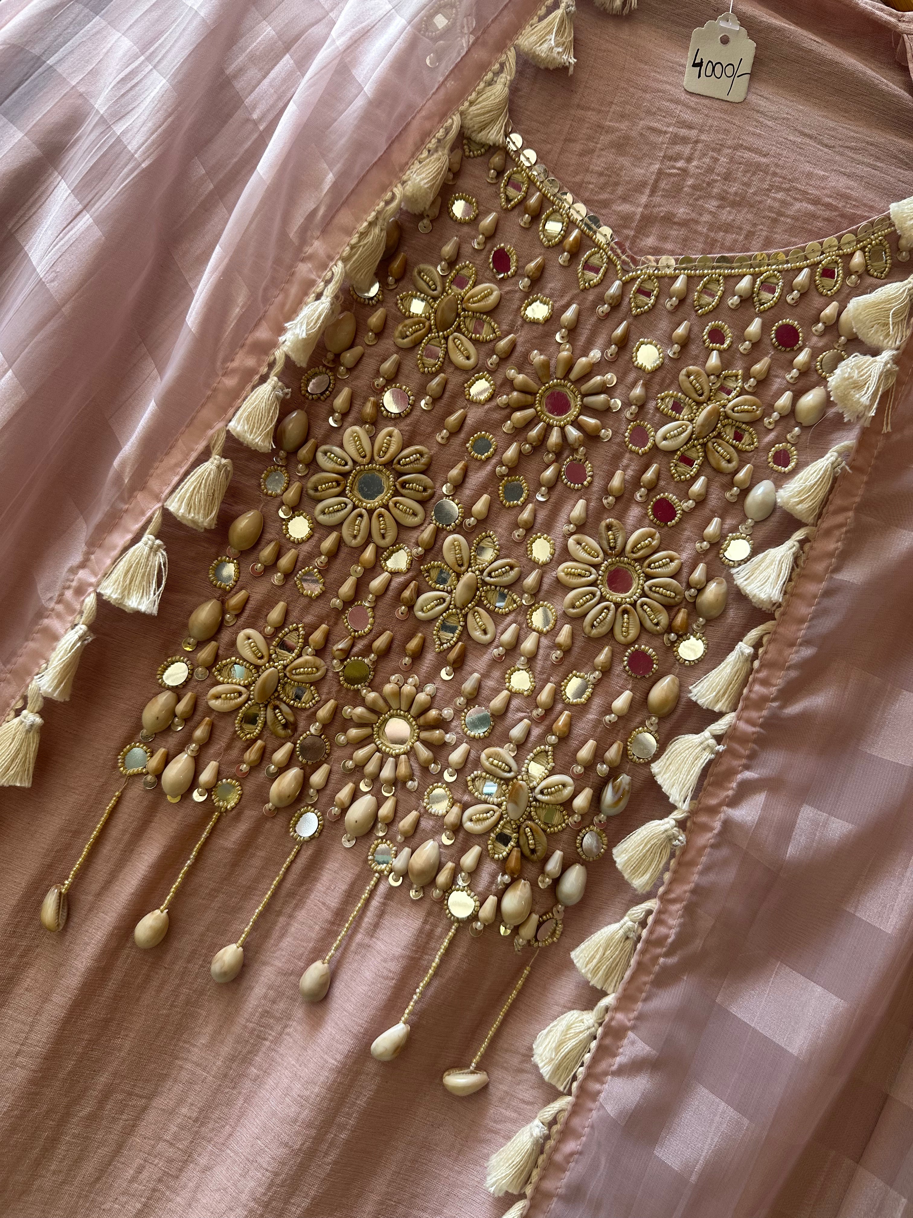UNSTITCHED MULMUL CHANDERI HANDWORK SUITS.