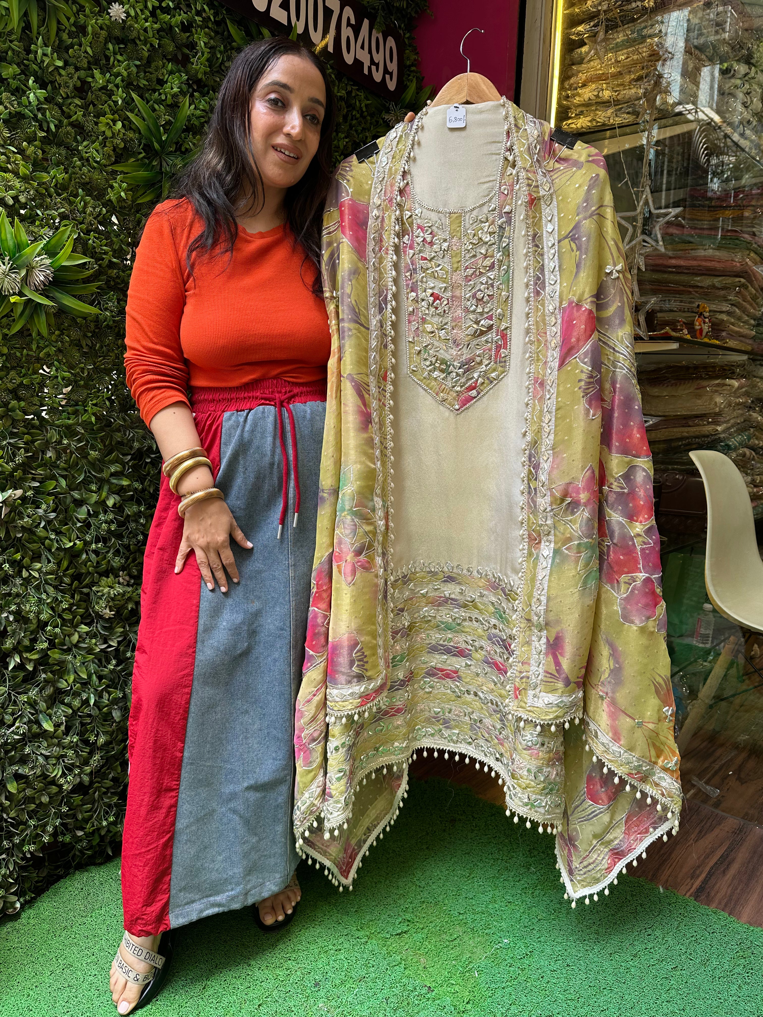 UNSTITCHED PURE TISSUE ORGANZA HANDWORK SUITS.