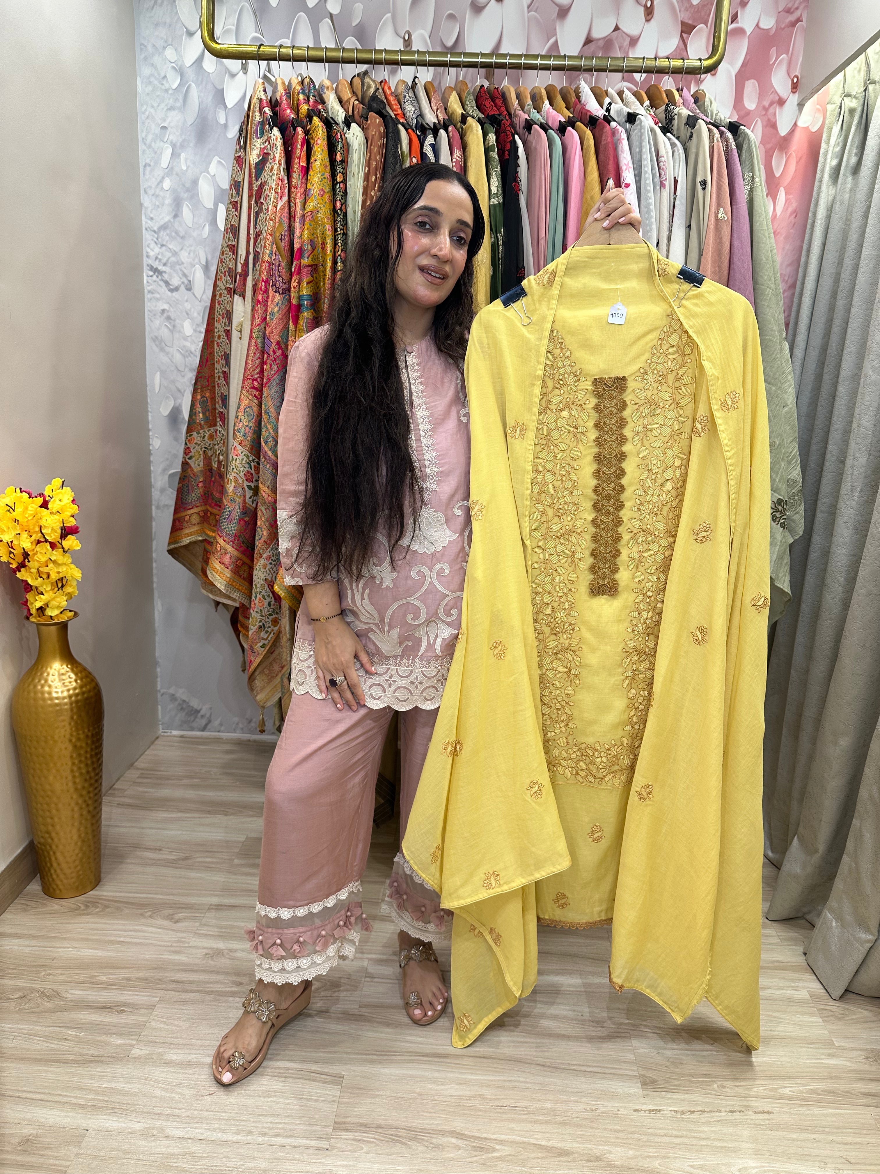 UNSTITCHED PURE MULMUL RESHAM WORK SUITS.