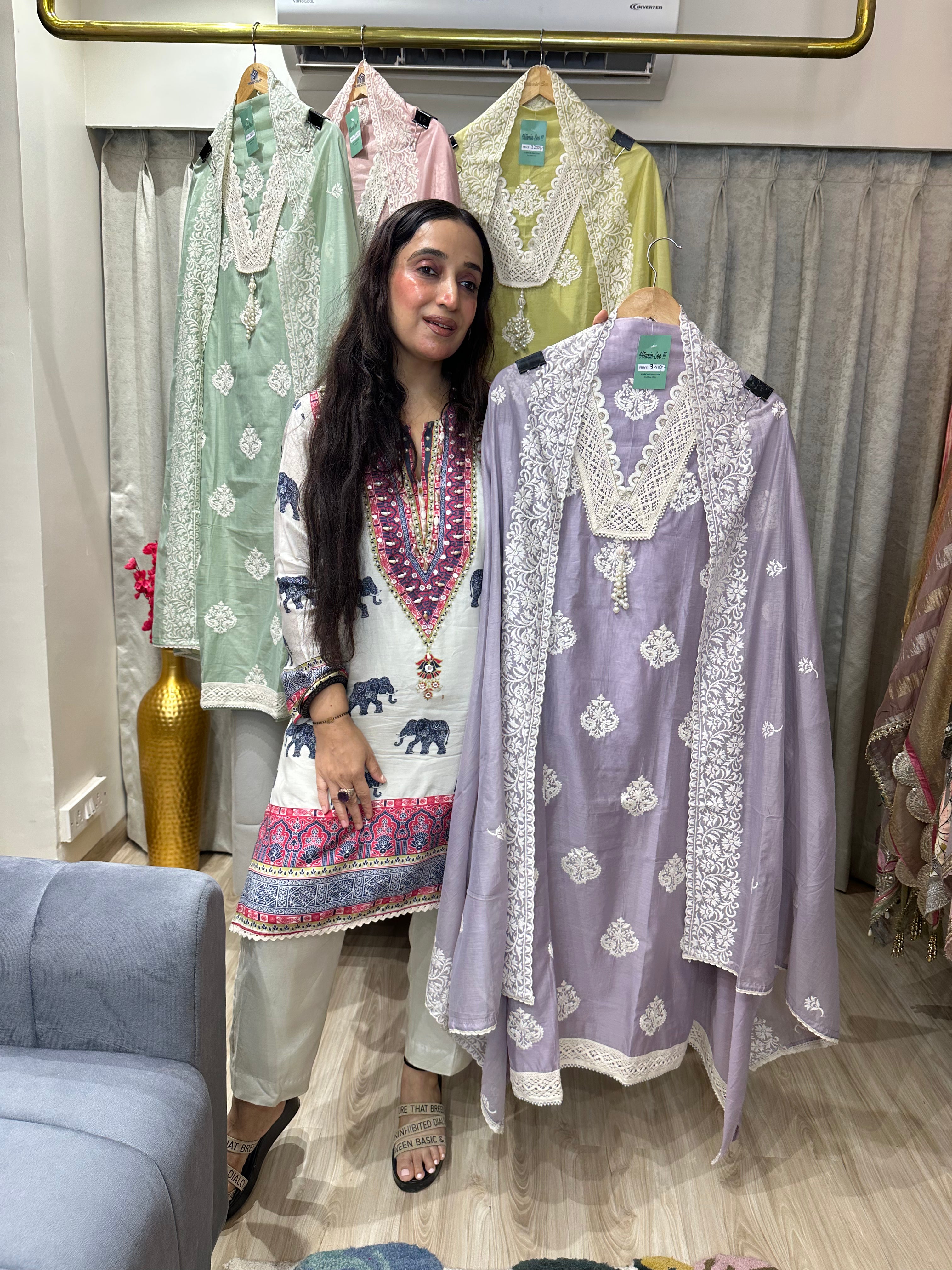 UNSTITCHED PURE MULMUL CHANDERI EMBROIDERED SUITS.