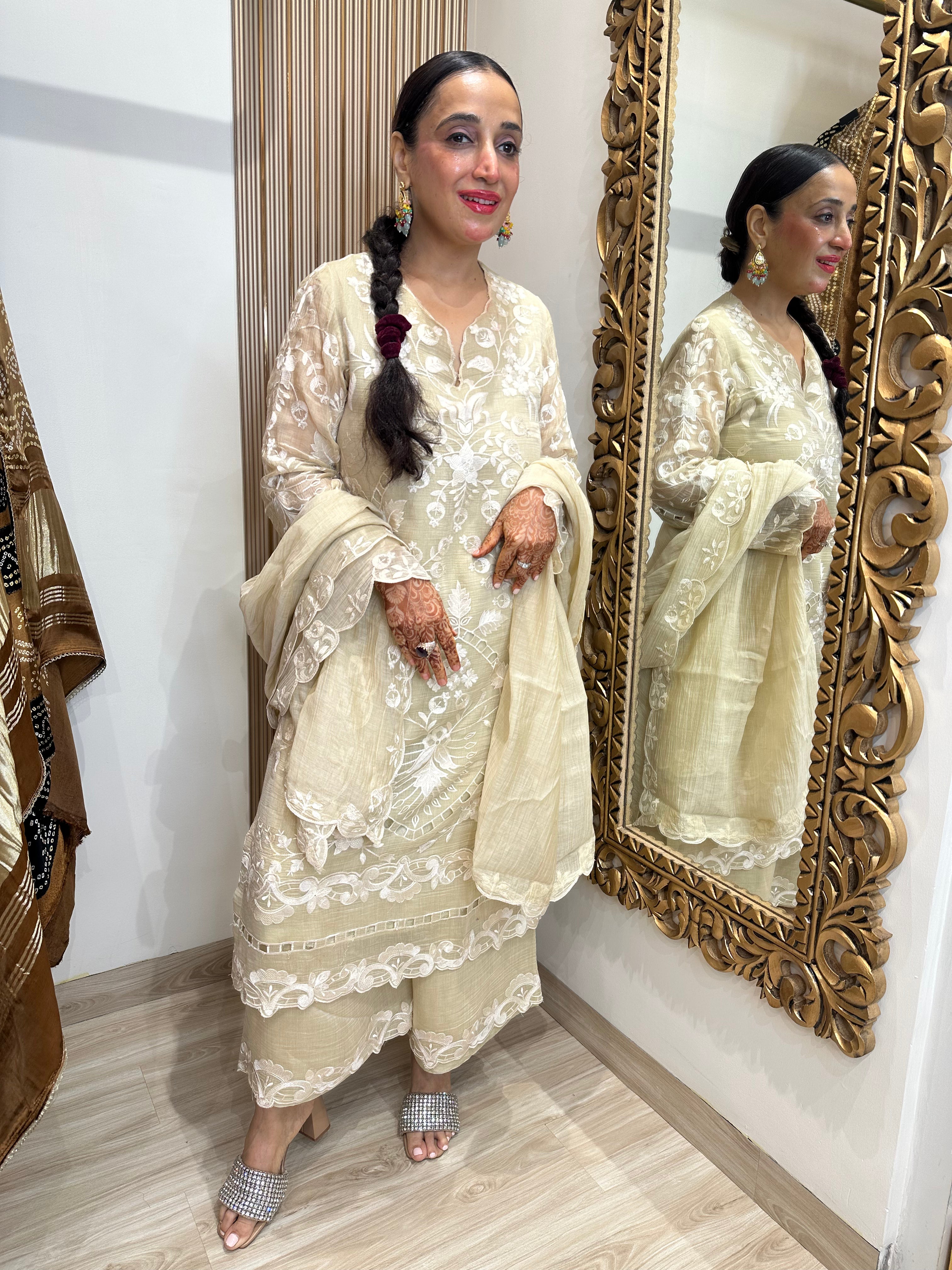 STITCHED PURE MULMUL CHANDERI CUTWORK SUITS.