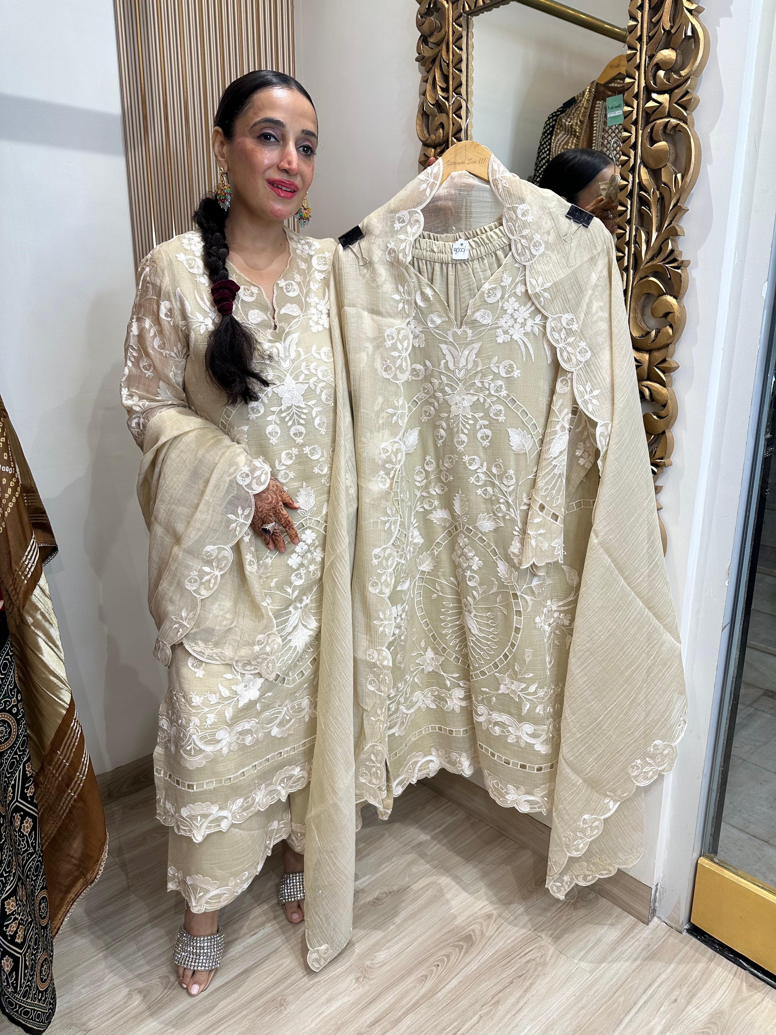 STITCHED PURE MULMUL CHANDERI CUTWORK SUITS.