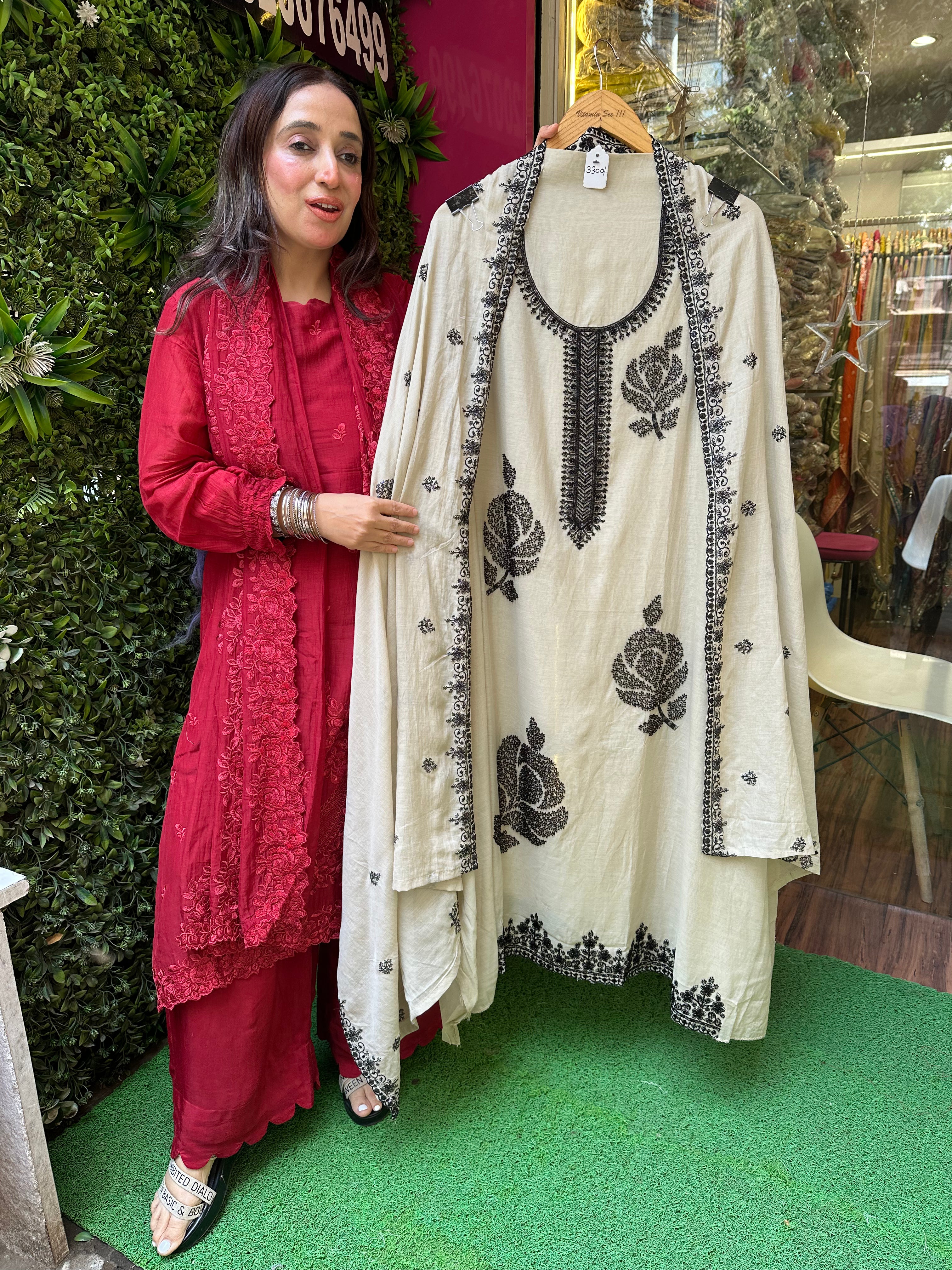 Unstitched PURE DESIGNER MULMUL HANDWORK SUITS.
