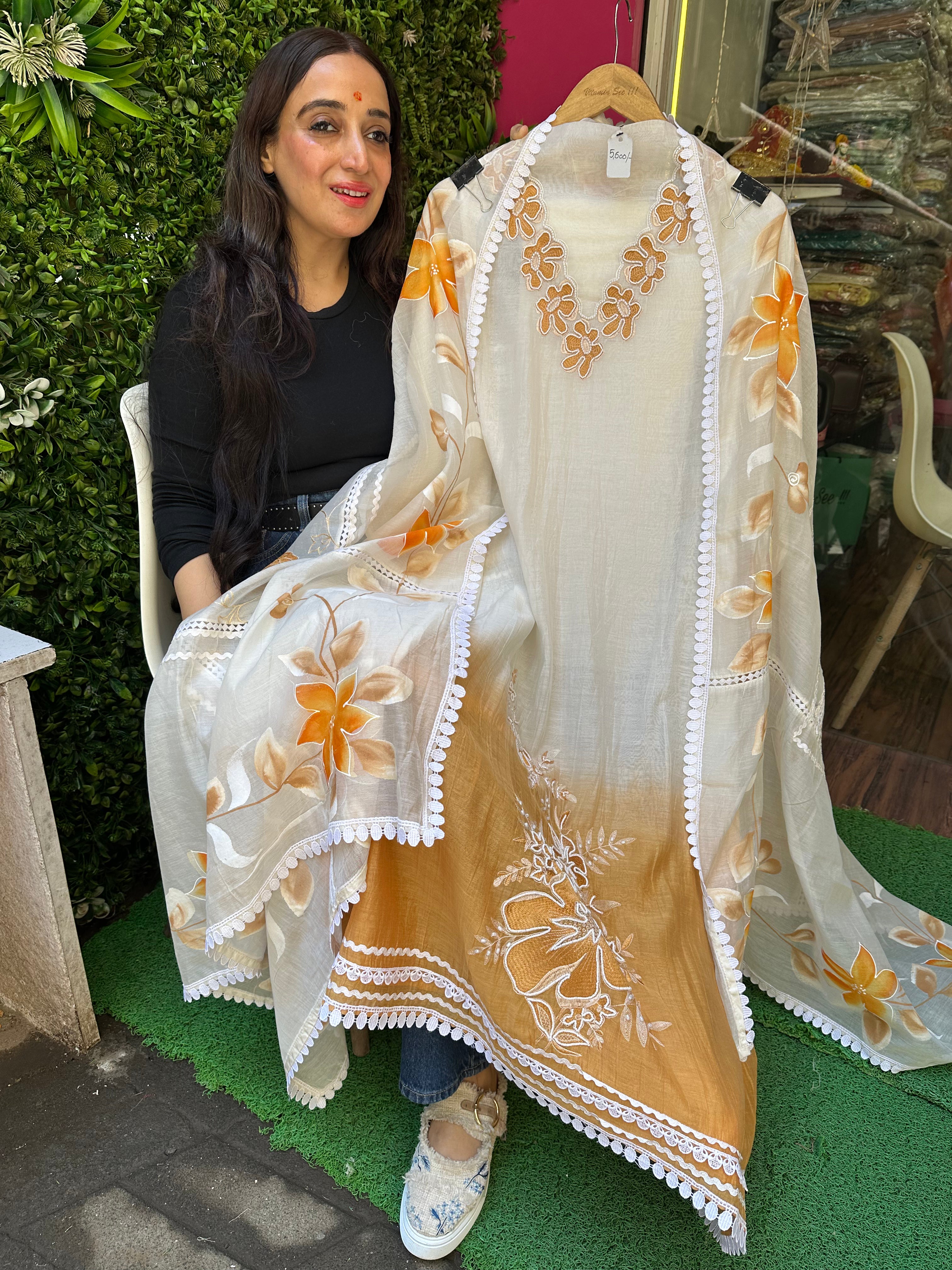 Unstitched PURE DESIGNER MULMUL HANDWORK SUITS.