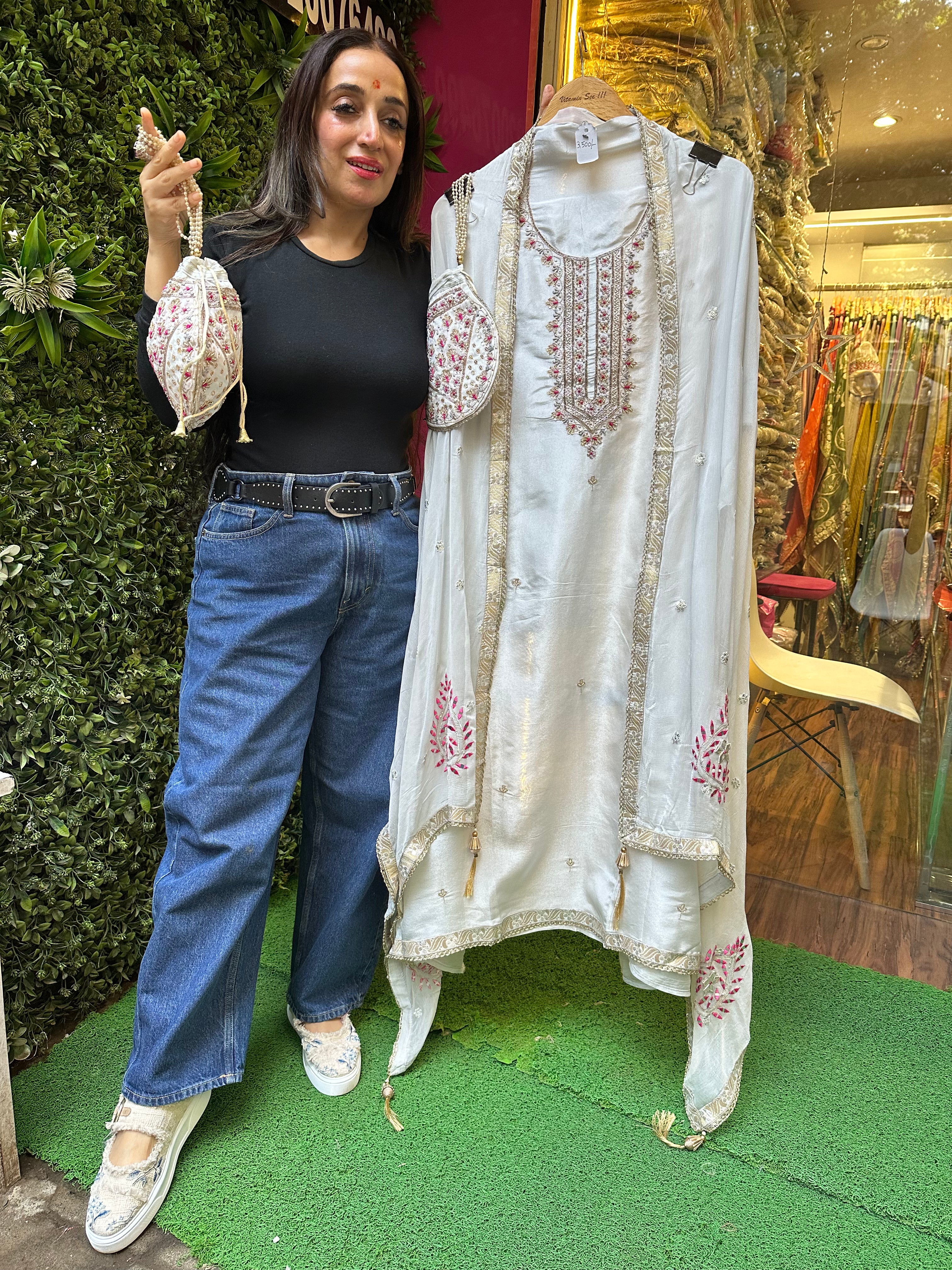 Unstitched PURE SHIMMER SILK SUITS WITH NALKI WORK AND POTLI.