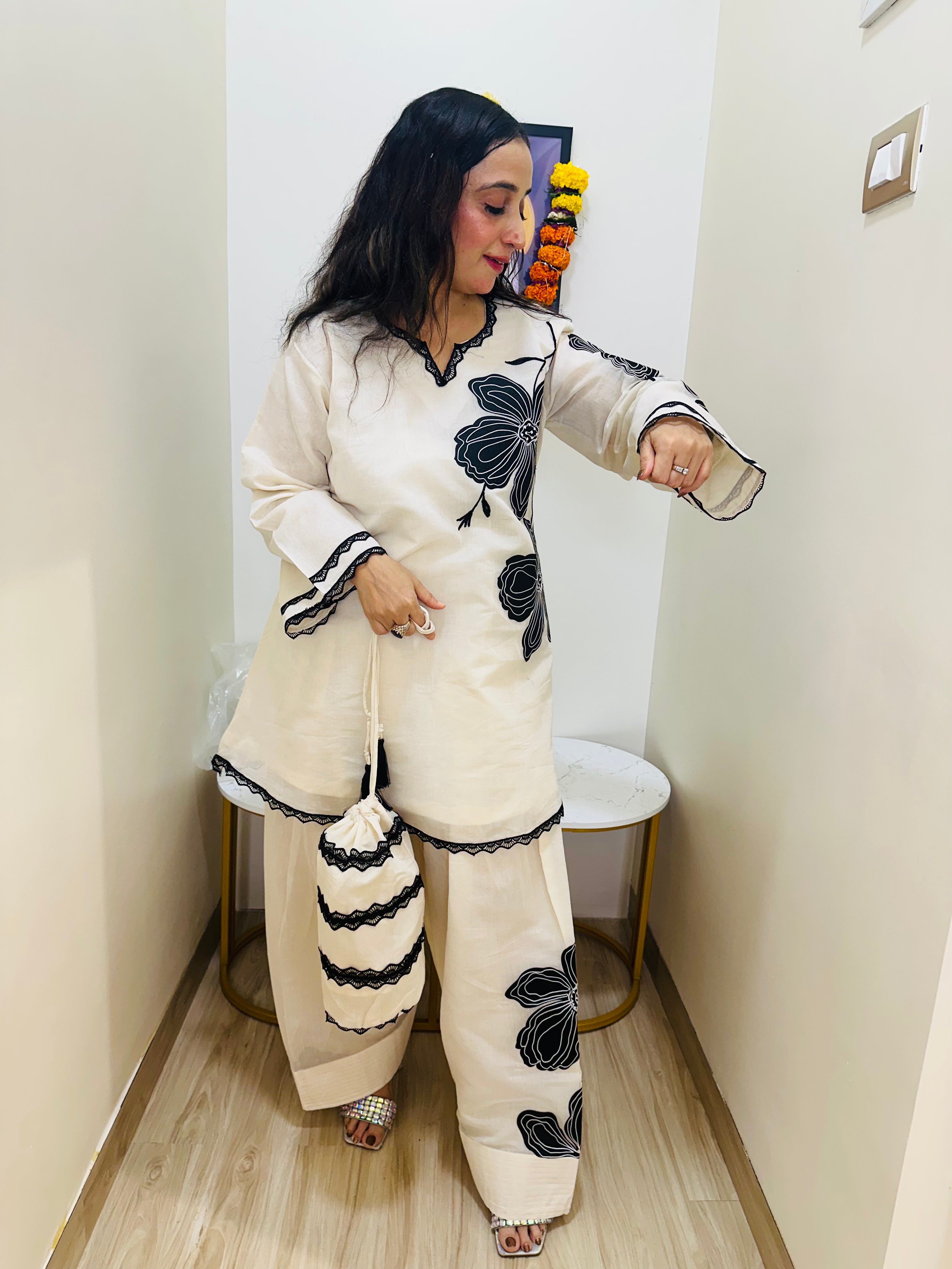 STITCHED PURE MULMUL CHANDERI COORD SETS WITH APPLIQUE WORK WITH FARSHI SALWAR.