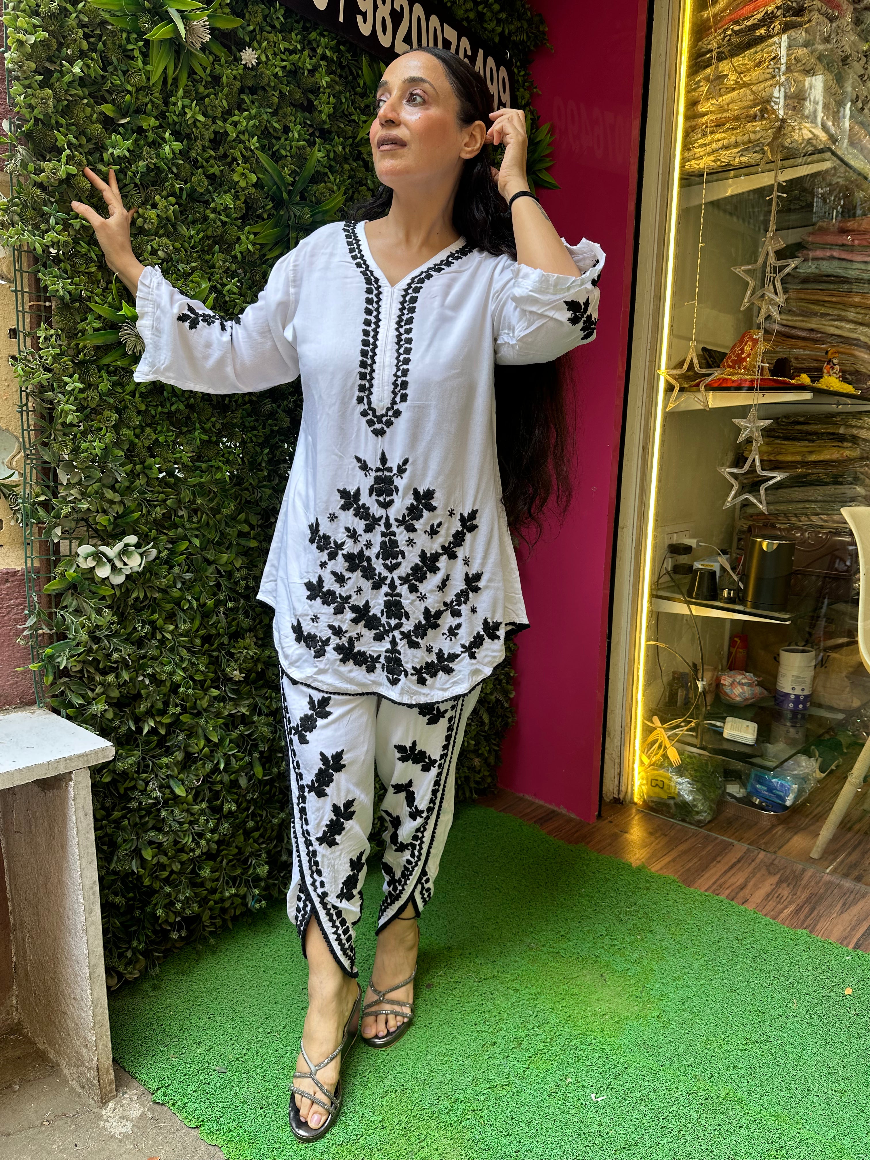 S..TITCHED PURE MULMUL HANDWORK DHOTI SETS.