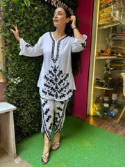 S..TITCHED PURE MULMUL HANDWORK DHOTI SETS.